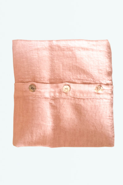 We are delighted to present this washed linen musk rose cushion cover, hand finished natural mother-of-pearl buttons from the Renaissance town of Carpi, south of Verona & North of Florence
