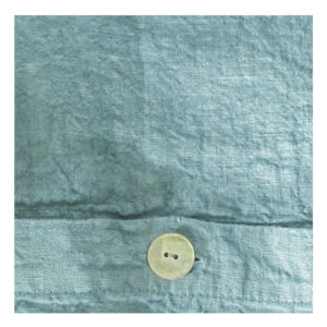 Washed Linen Pistachio Blue Cushion Cover, hand finished natural mother-of-pearl buttons in the Renaissance town of Carpi, south of Verona & North of Florence.
